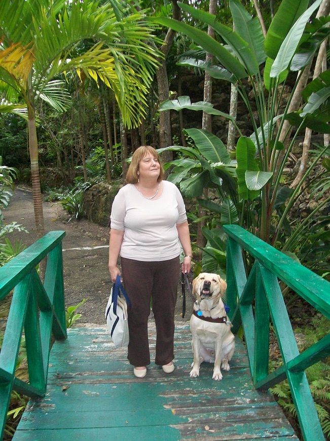 picture of Terry and Trooper on a footbridge, among more vegetation